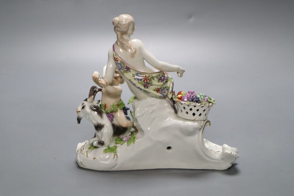 A 19th century Meissen group, Bacchante with putto and goat (damage), possibly part of a centrepiece
